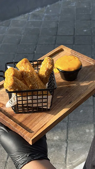 Chicken tenders with cheese dipping sauce