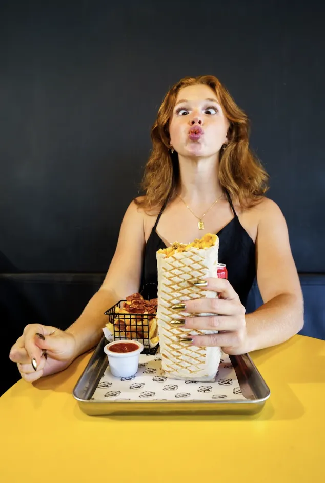 Guest with a giant French tacos at Bon Appétit Bali